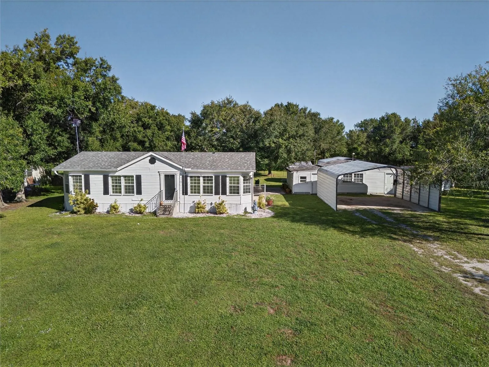 5504 SWAYING PALM DR