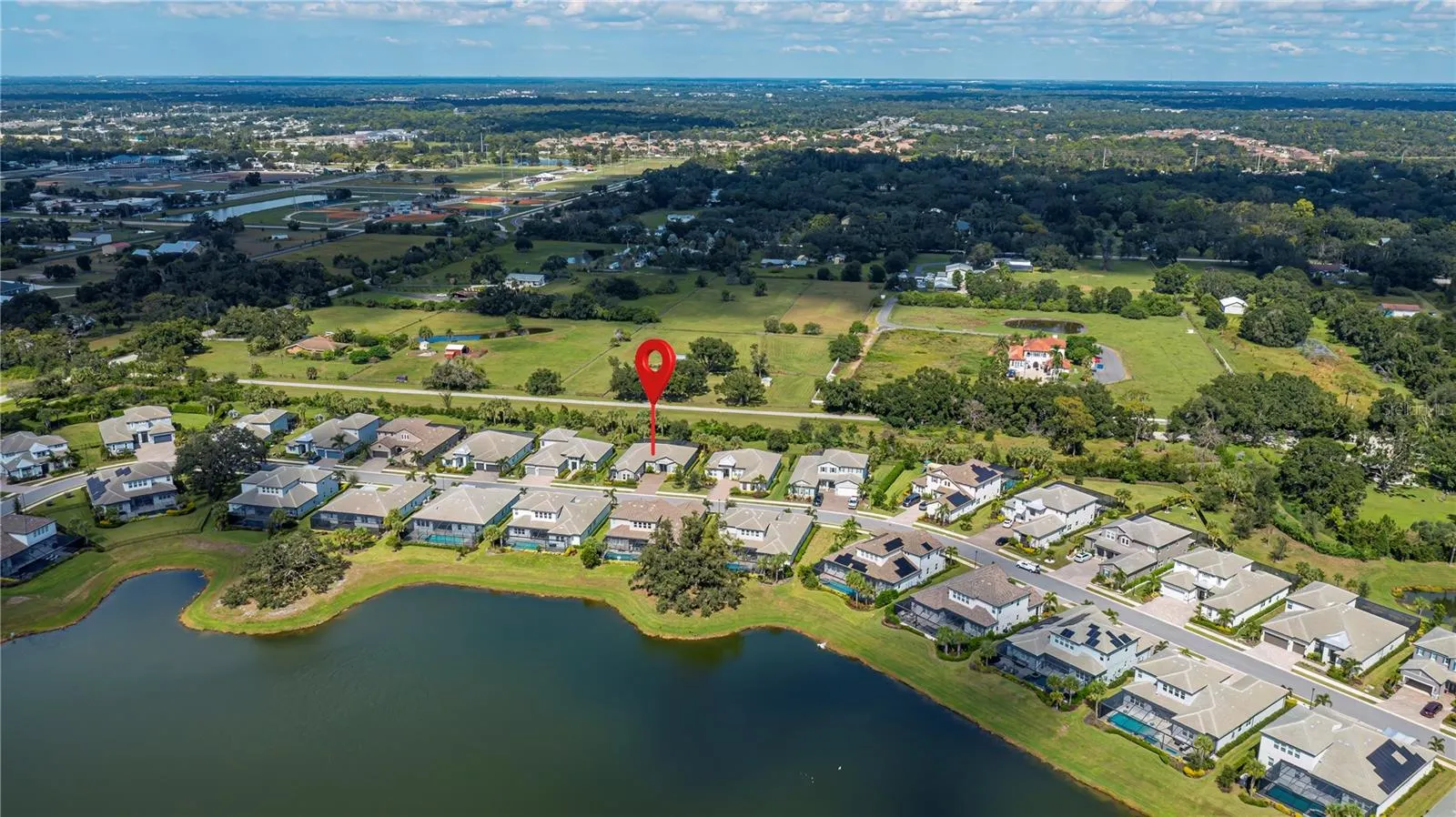 6137 LUNGO LAGO DR