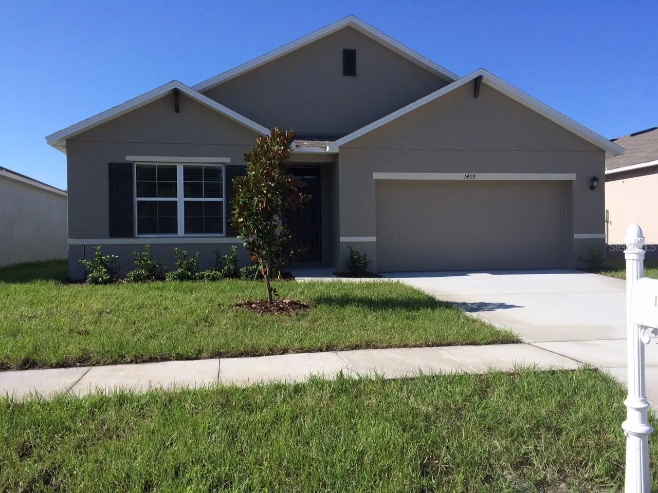 1409 WALLACE MANOR PASS
