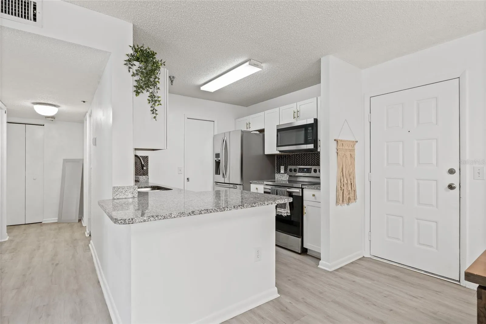 15215 AMBERLY DR #1002, #1002