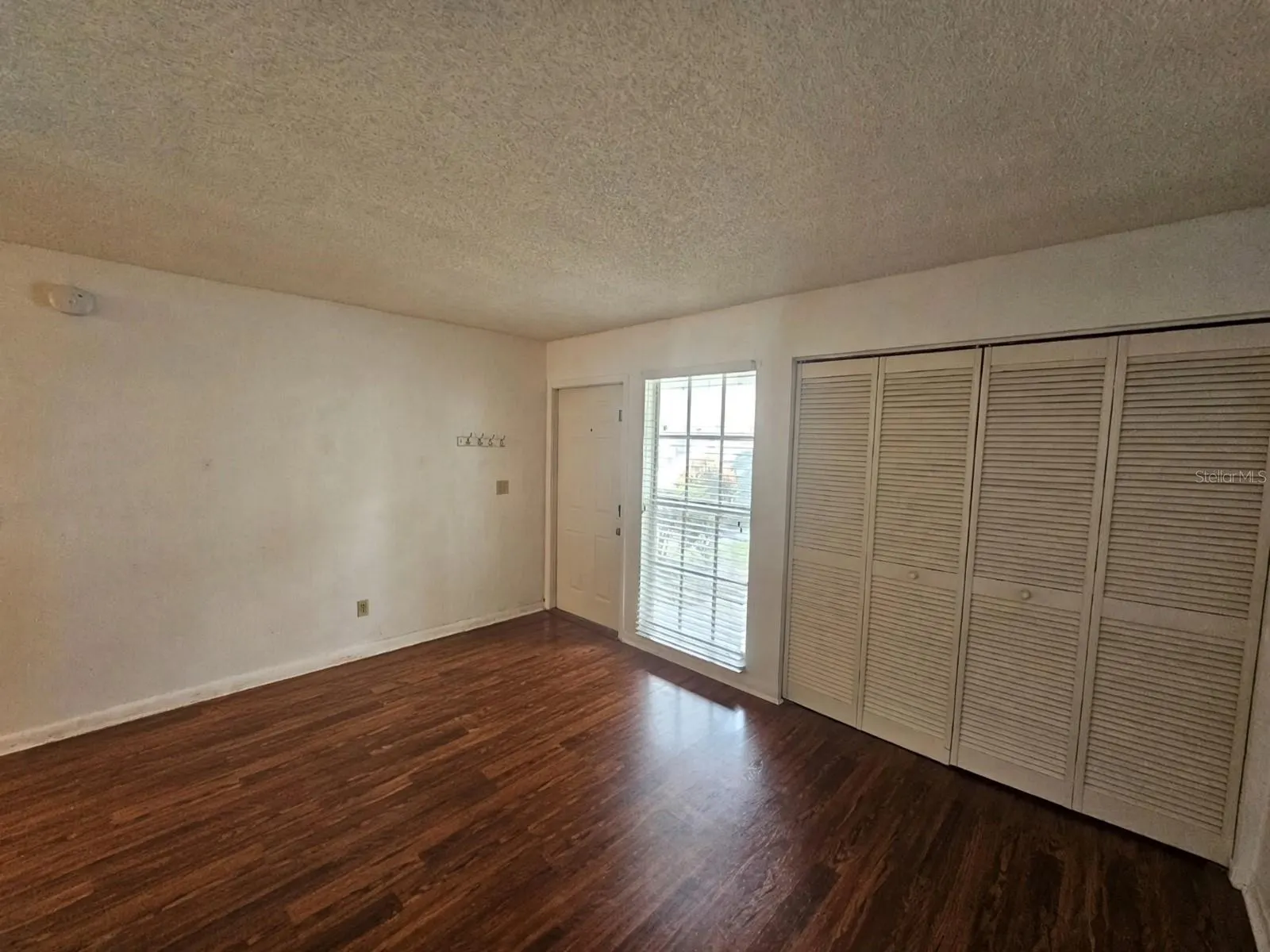 16223 W RAMBLING VINE DR