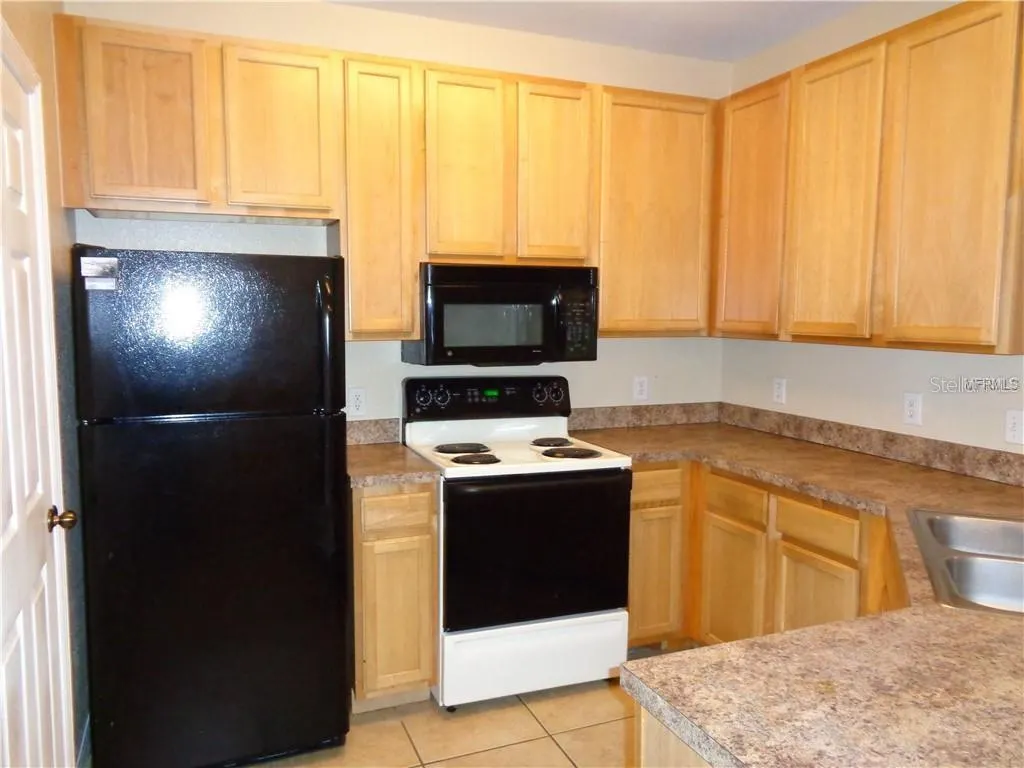 10205 COURTNEY PALMS BLVD #204, #204