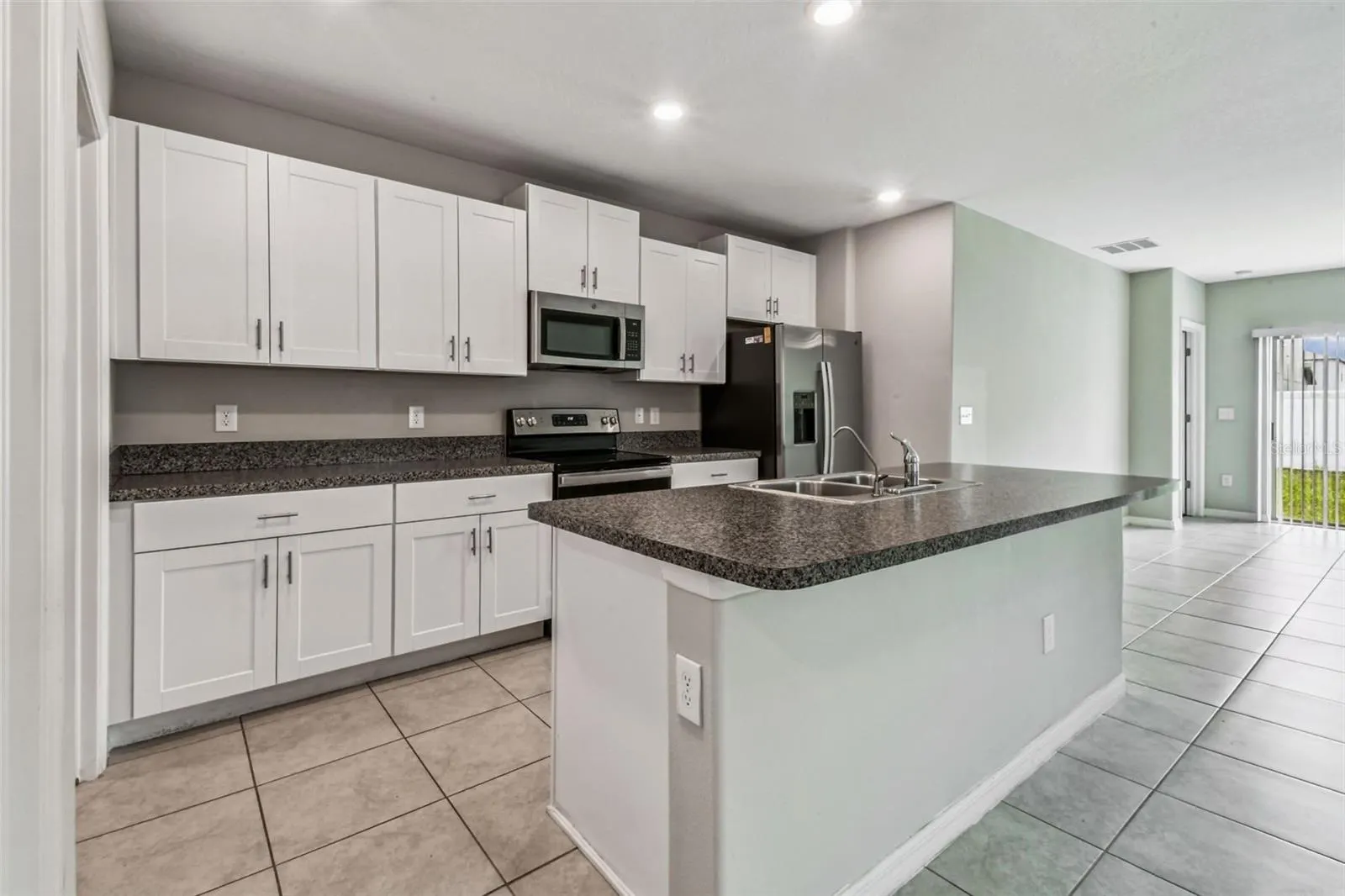 7205 RONNIE GARDENS CT