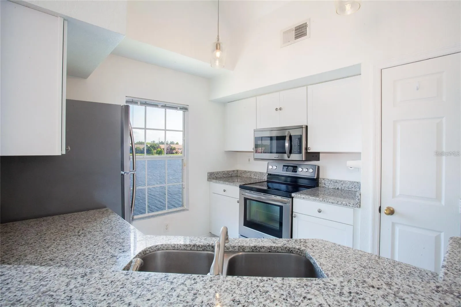 9704 LAKE CHASE ISLAND WAY #9704, #9704