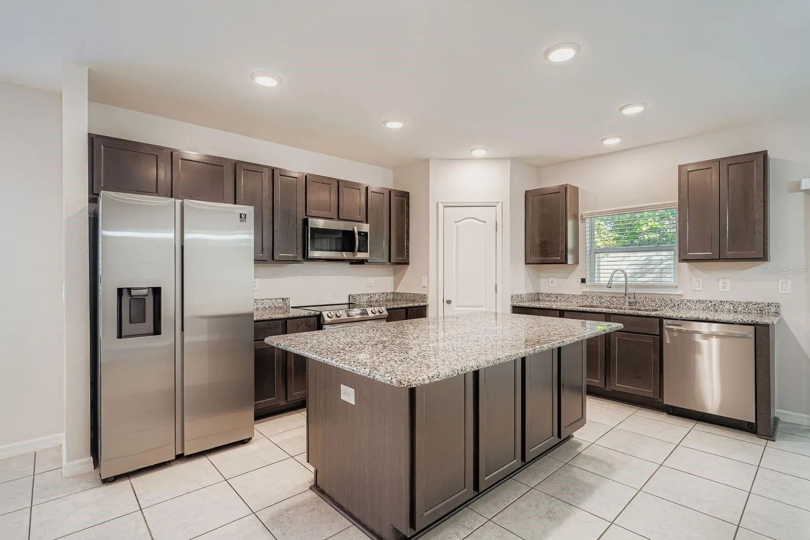 10906 LITTLE FLOWER AVE