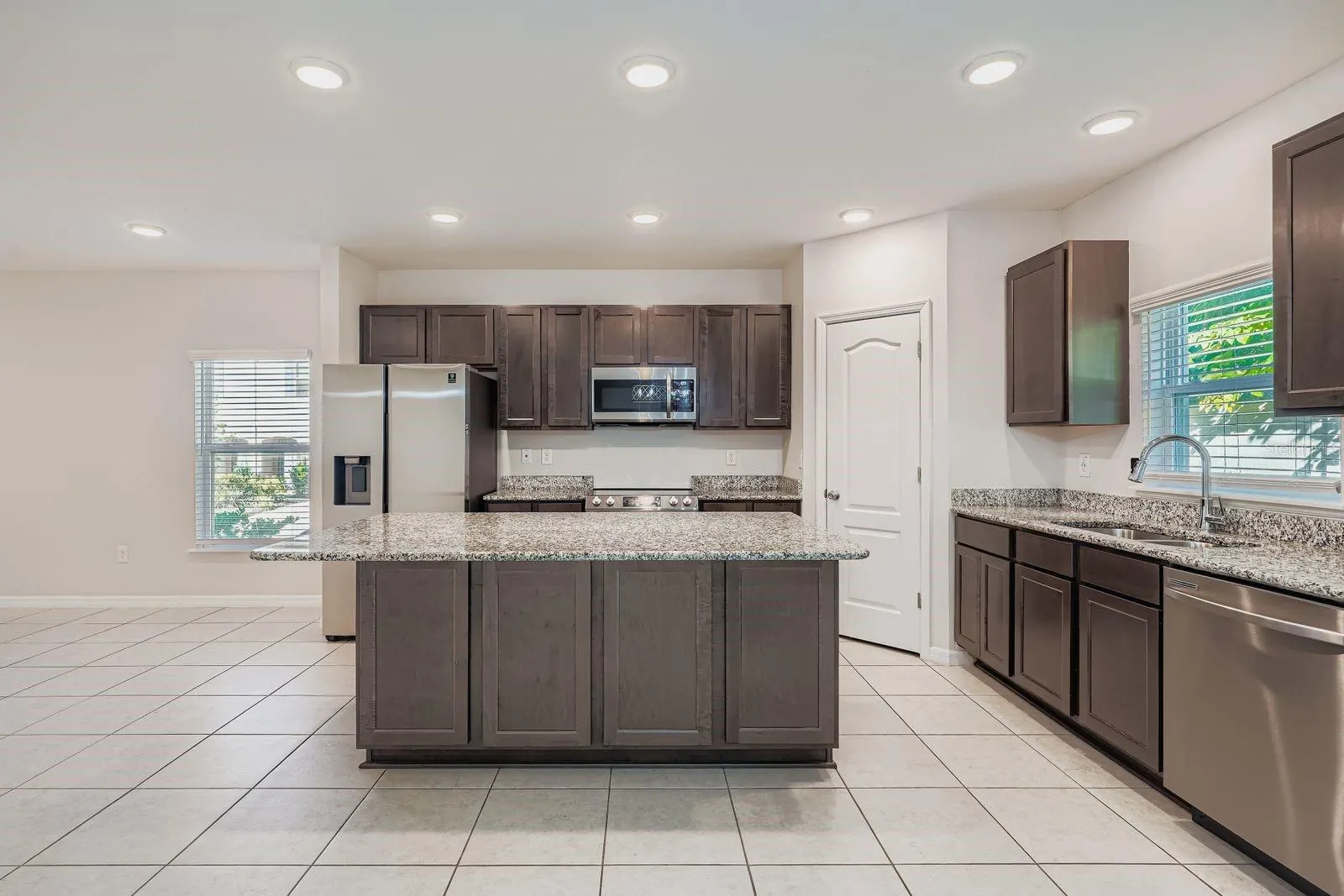 10906 LITTLE FLOWER AVE