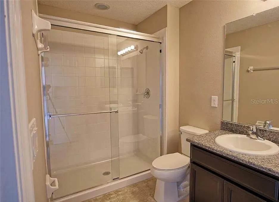 7026 WOODCHASE GLEN DR