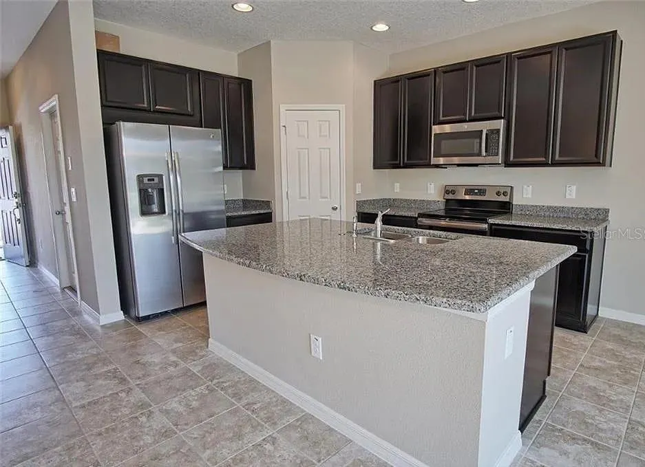 7026 WOODCHASE GLEN DR