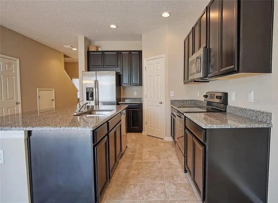7026 WOODCHASE GLEN DR