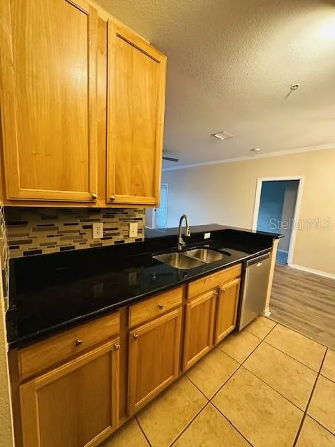 10203 COURTNEY PALMS BLVD #202 #202