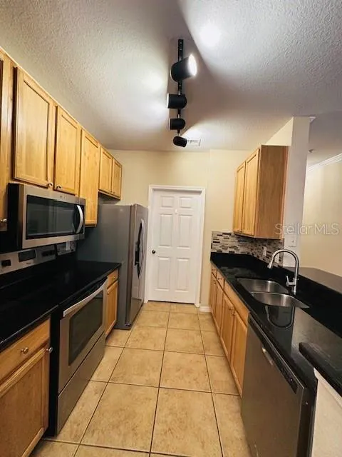 10203 COURTNEY PALMS BLVD #202 #202