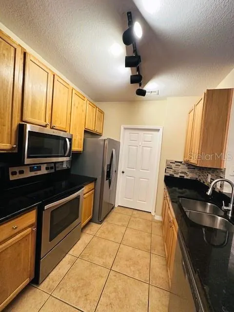 10203 COURTNEY PALMS BLVD #202 #202