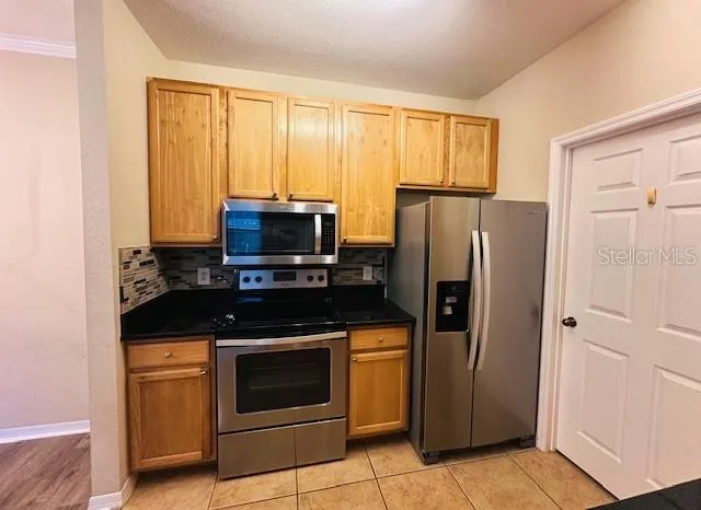 10203 COURTNEY PALMS BLVD #202 #202