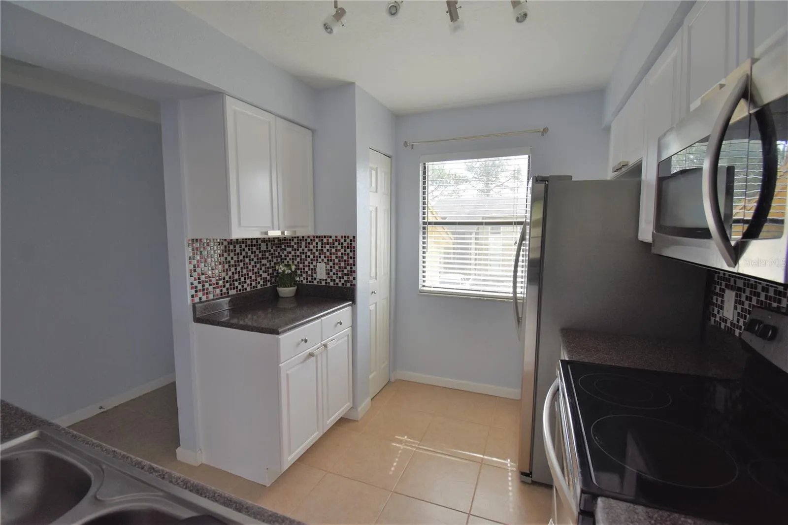 10177 SAILWINDS BLVD S #203 #203