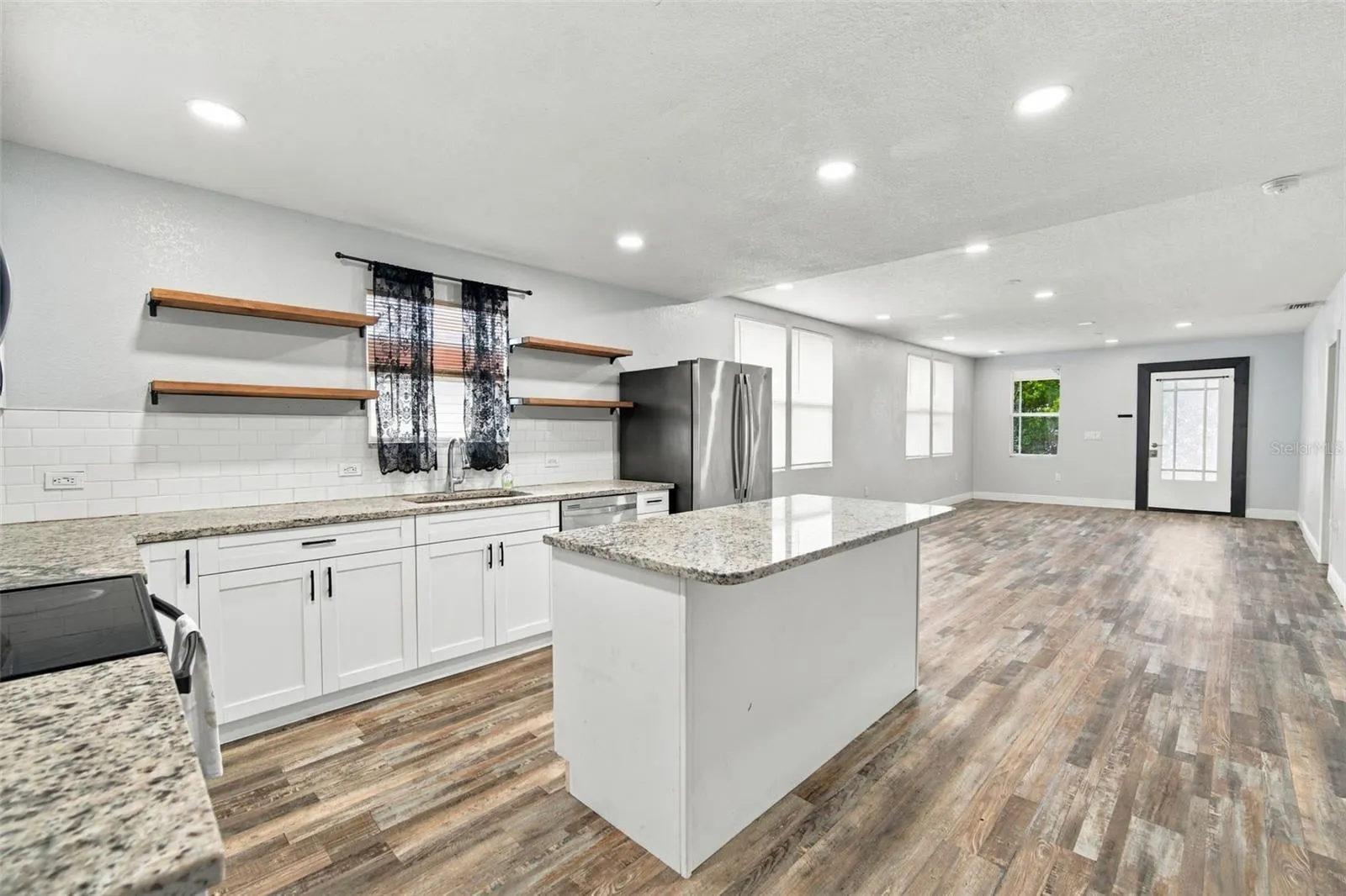 1411 E 24TH AVE