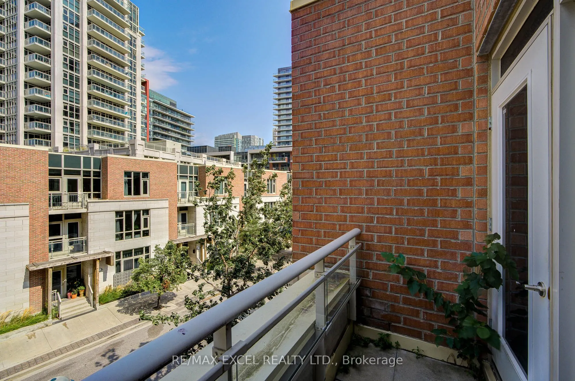 93 Sloping Sky Mews, #TH 1
