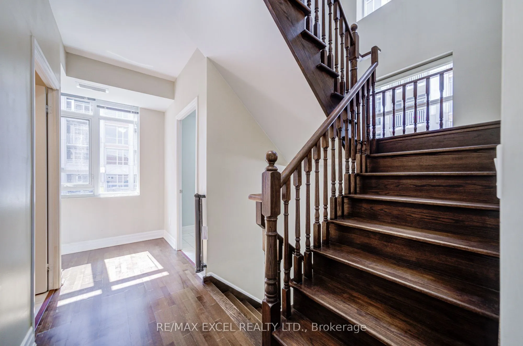 93 Sloping Sky Mews, #TH 1