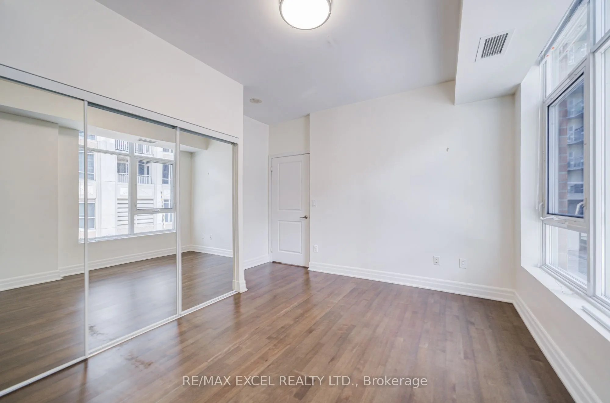 93 Sloping Sky Mews, #TH 1
