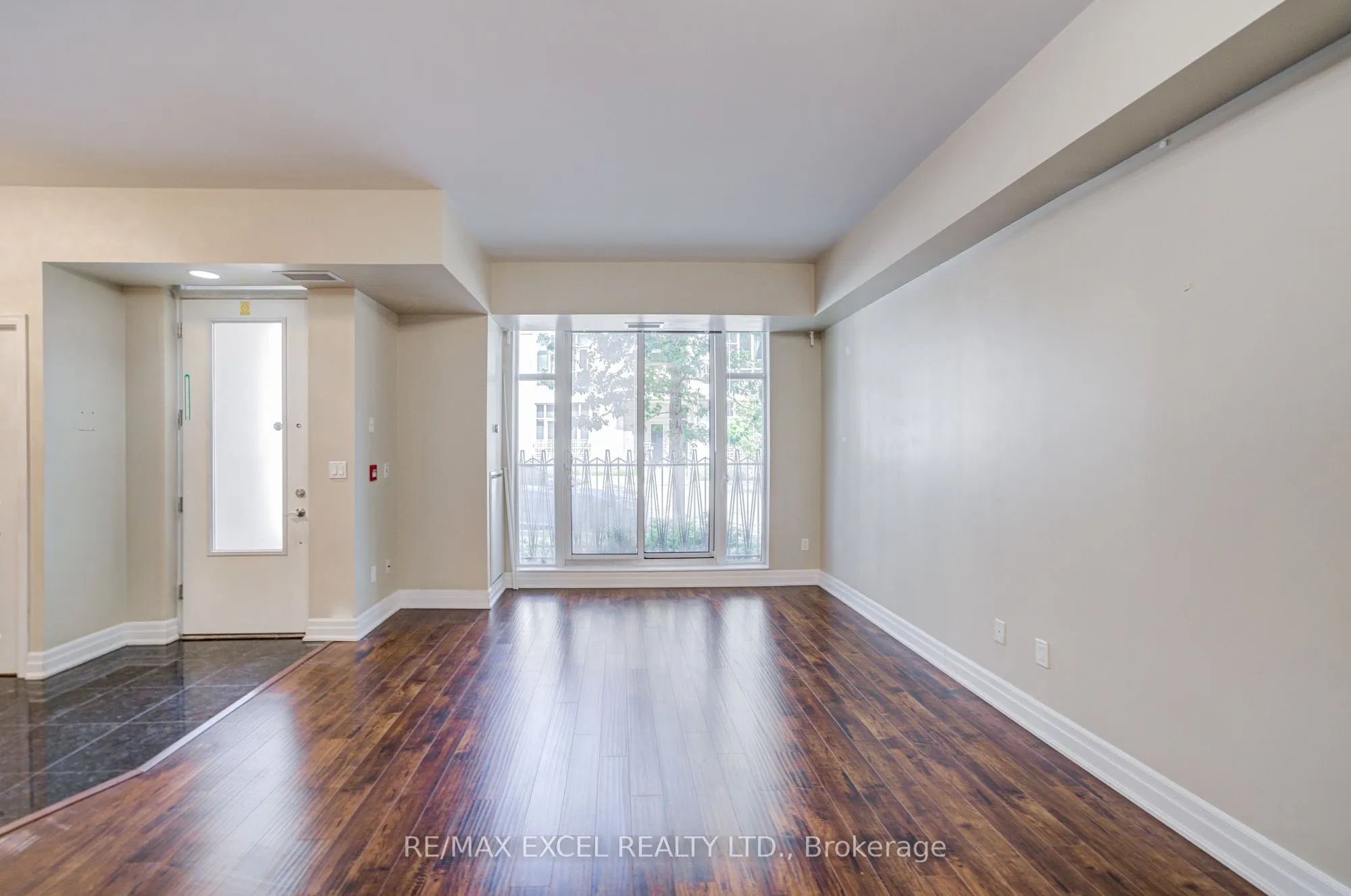 93 Sloping Sky Mews, #TH 1