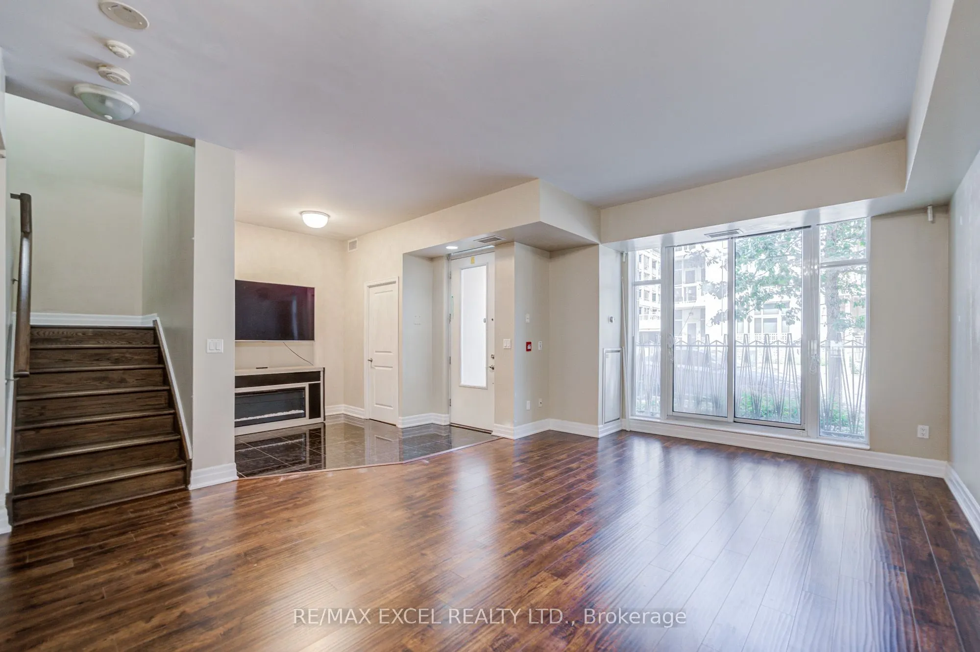 93 Sloping Sky Mews, #TH 1