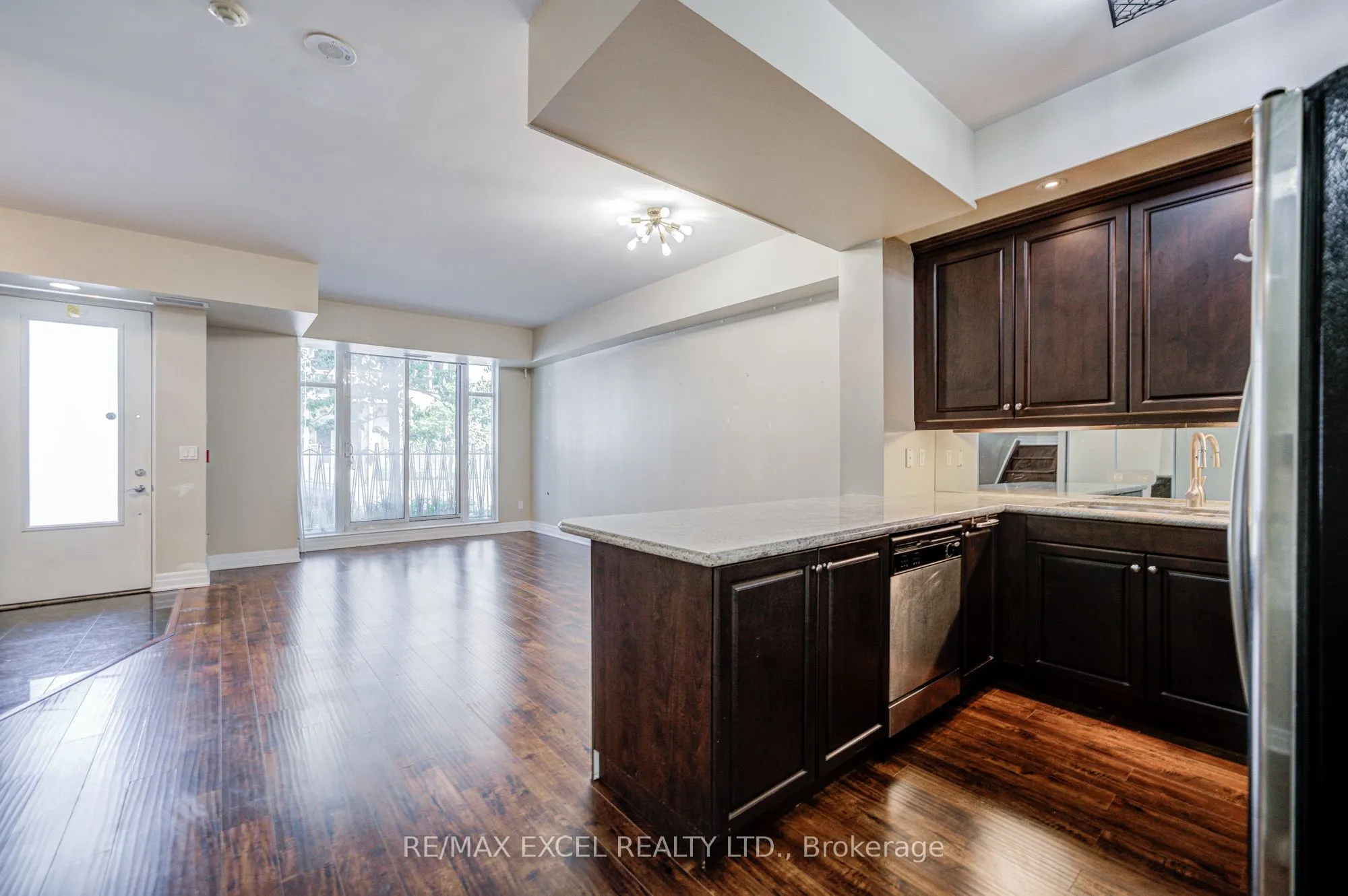 93 Sloping Sky Mews, #TH 1