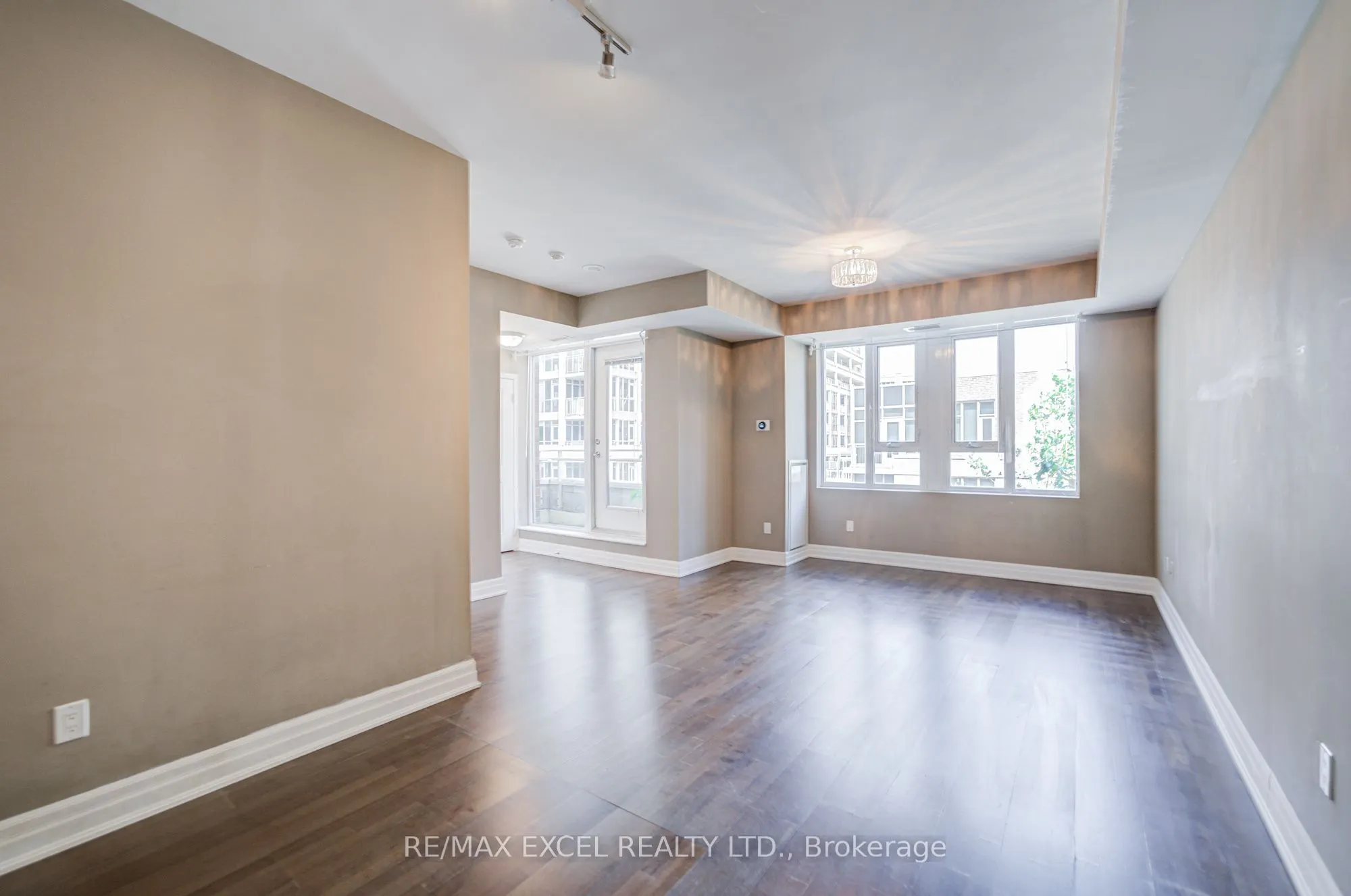 93 Sloping Sky Mews, #TH 1