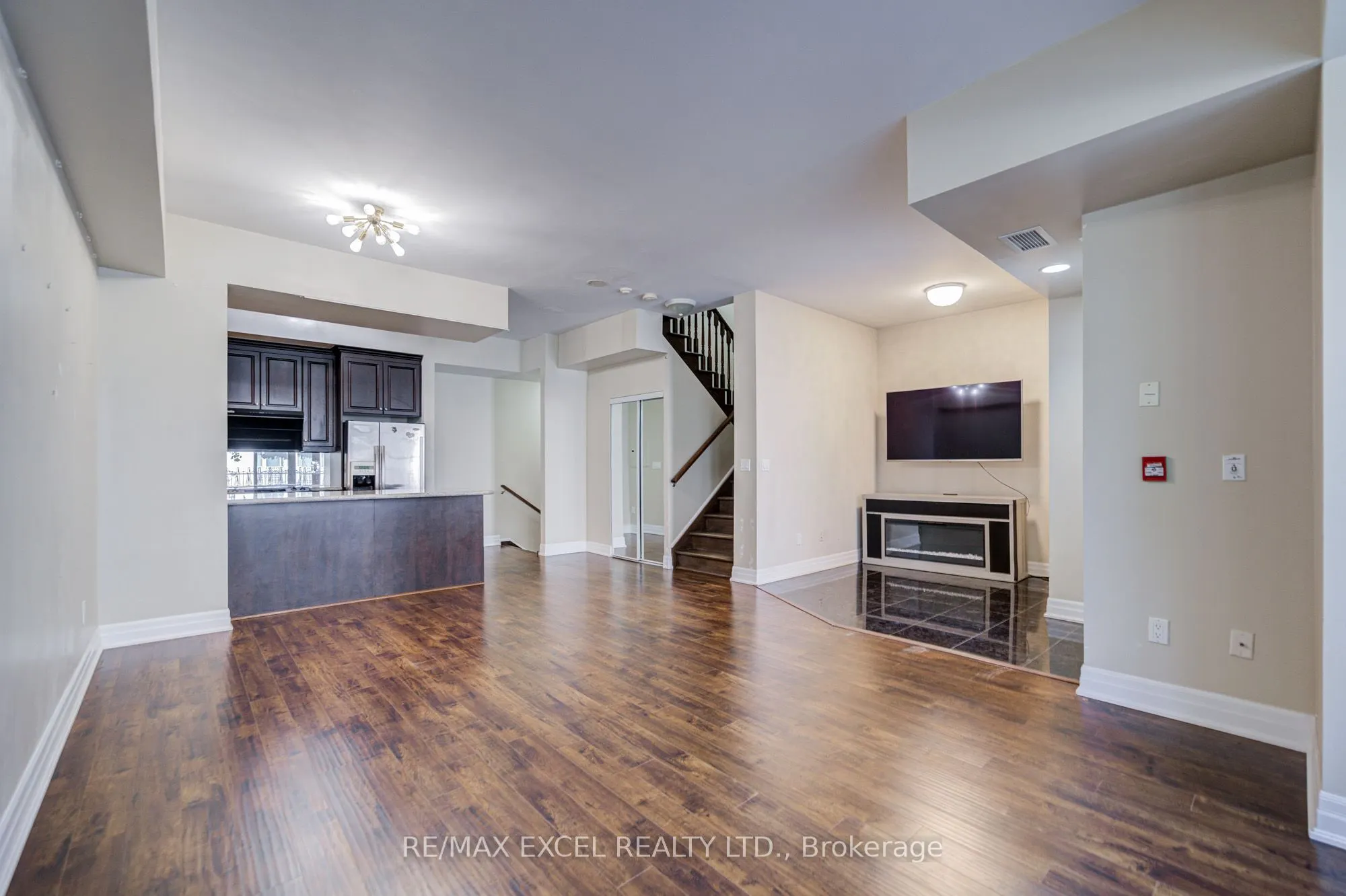 93 Sloping Sky Mews, #TH 1