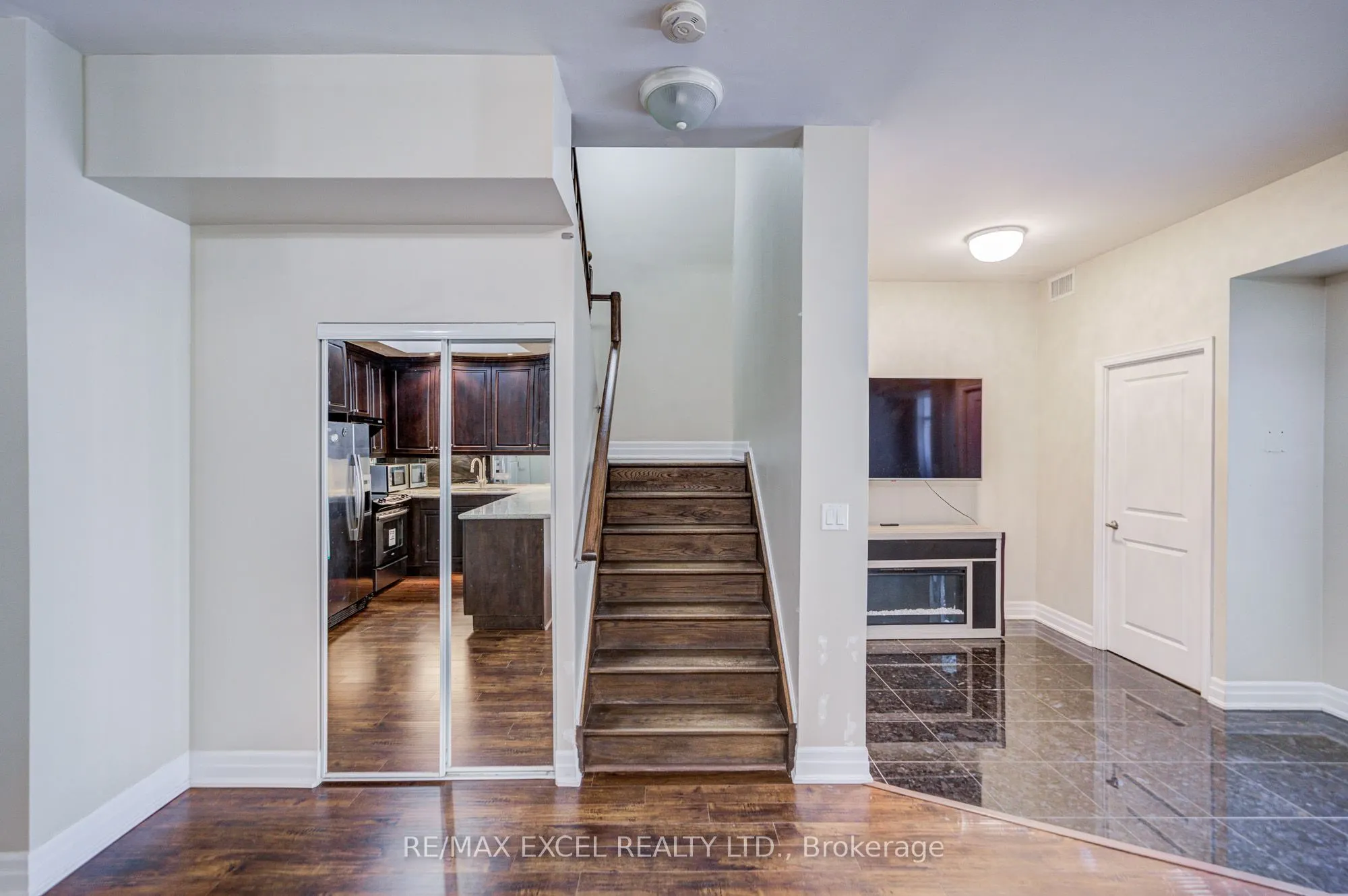 93 Sloping Sky Mews, #TH 1