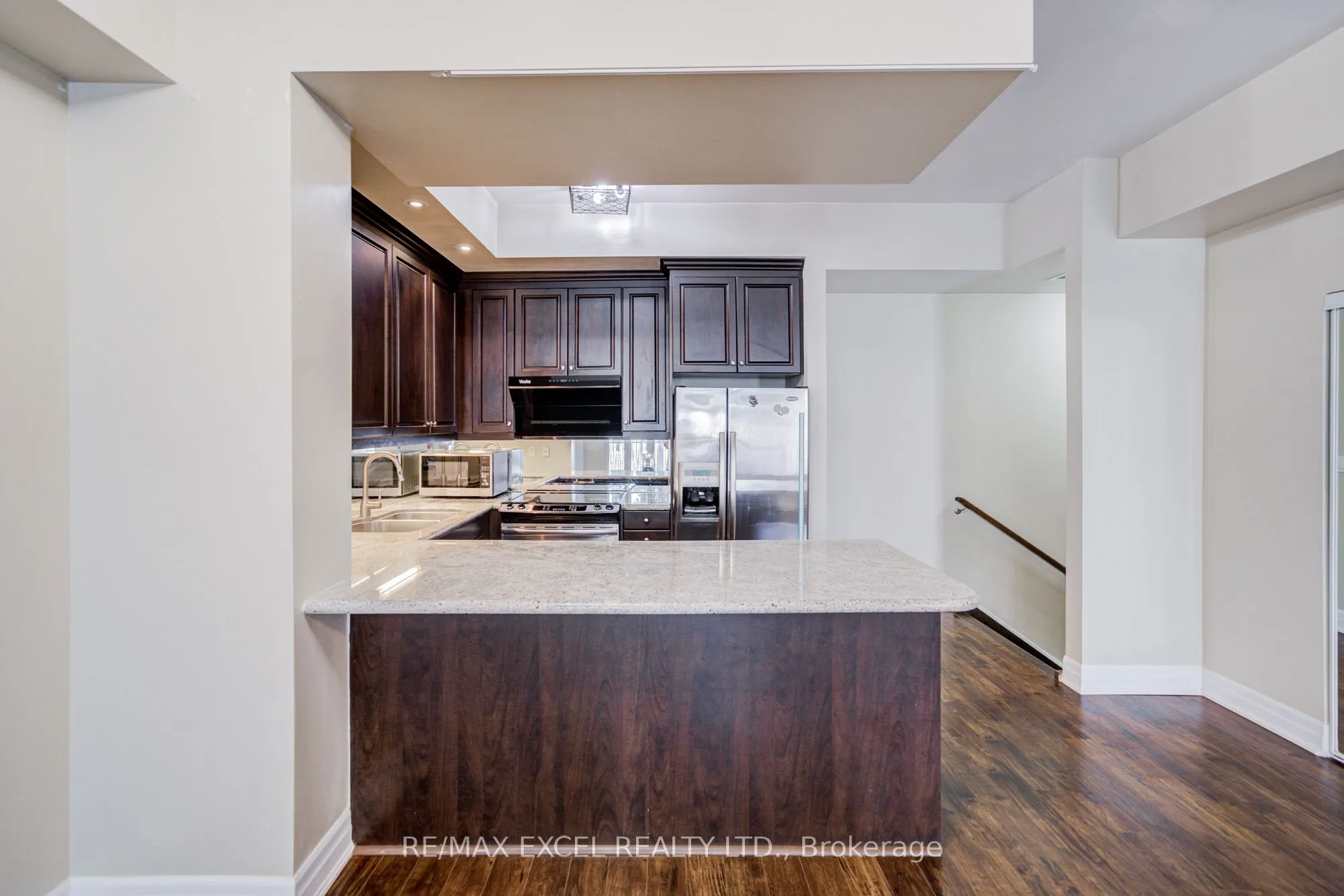 93 Sloping Sky Mews, #TH 1