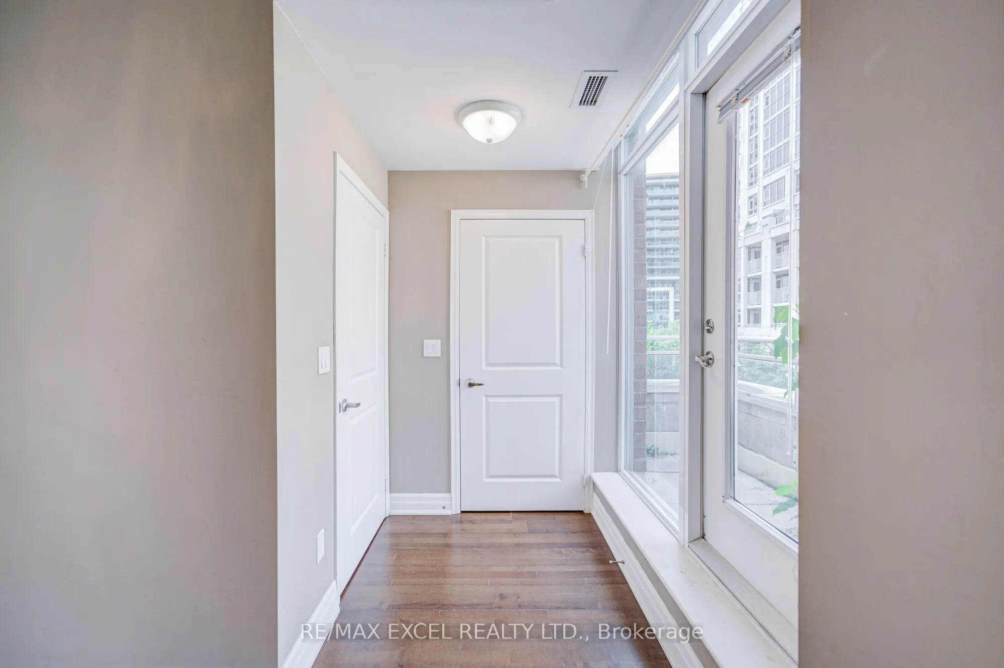 93 Sloping Sky Mews, #TH 1