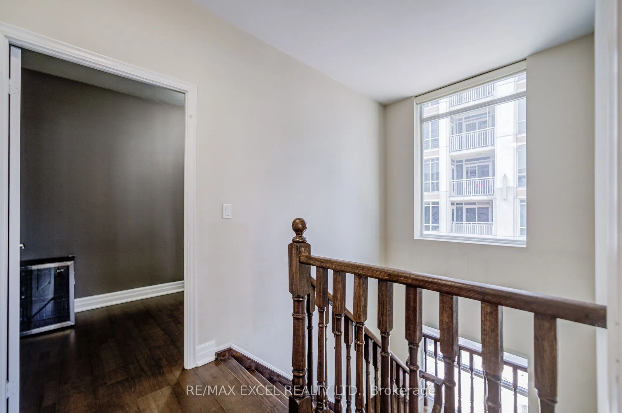 93 Sloping Sky Mews, #TH 1