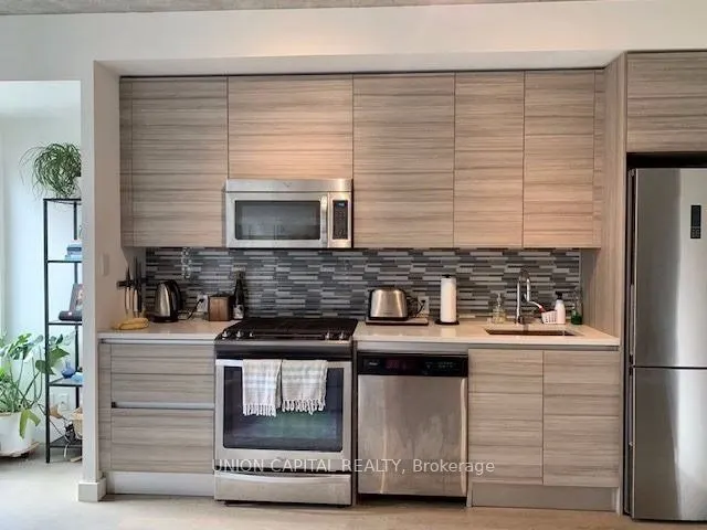111 Bathurst Street, #303