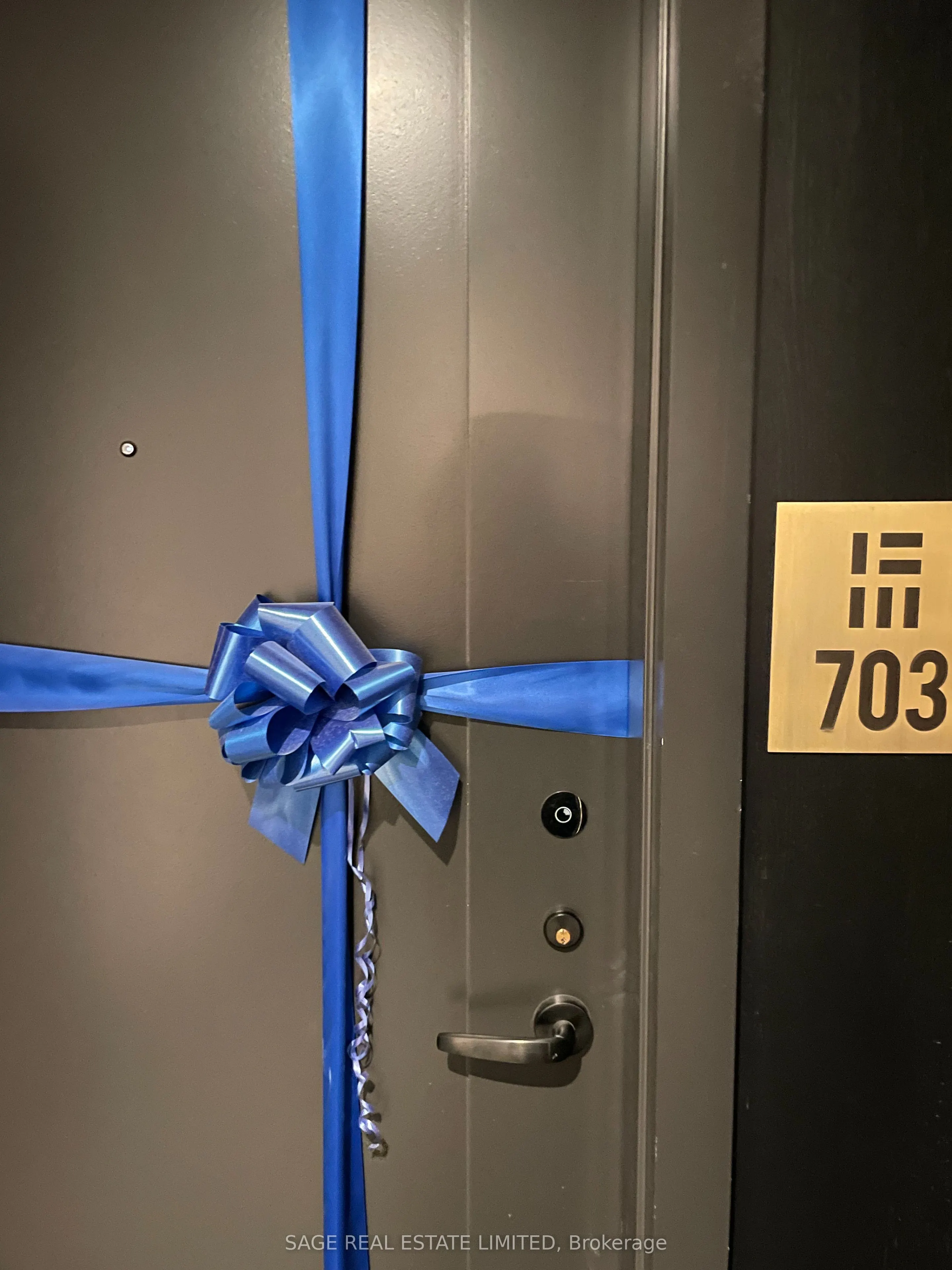 123 Portland Street, #703