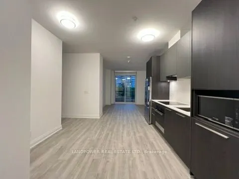 65 Broadway Avenue, #404