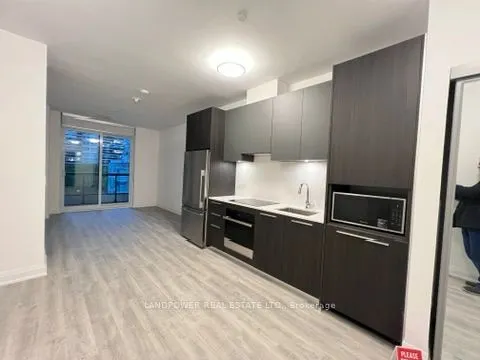 65 Broadway Avenue, #404