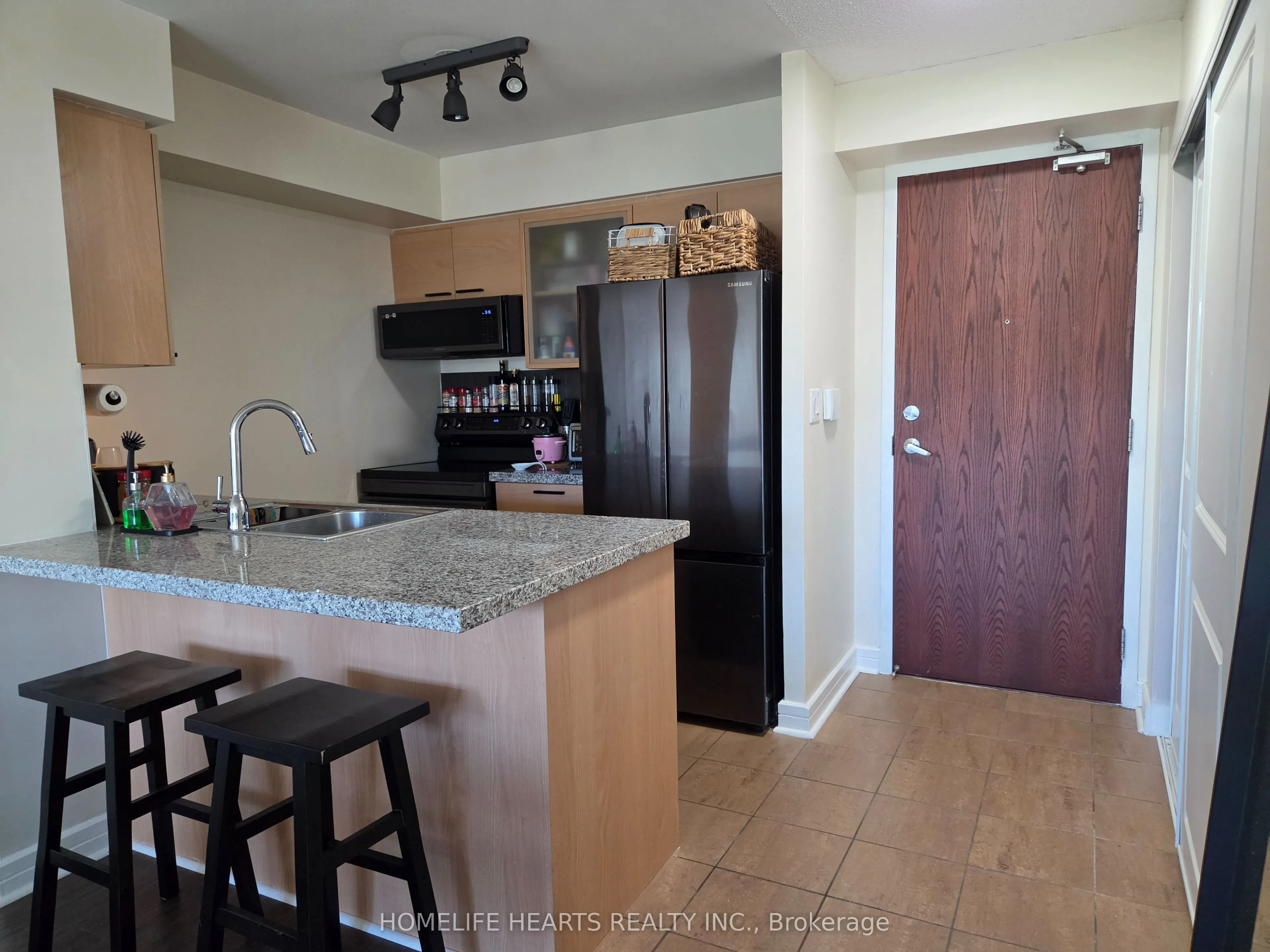 18 Harrison Garden Boulevard #210