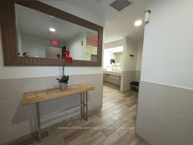 18 Harrison Garden Boulevard #210