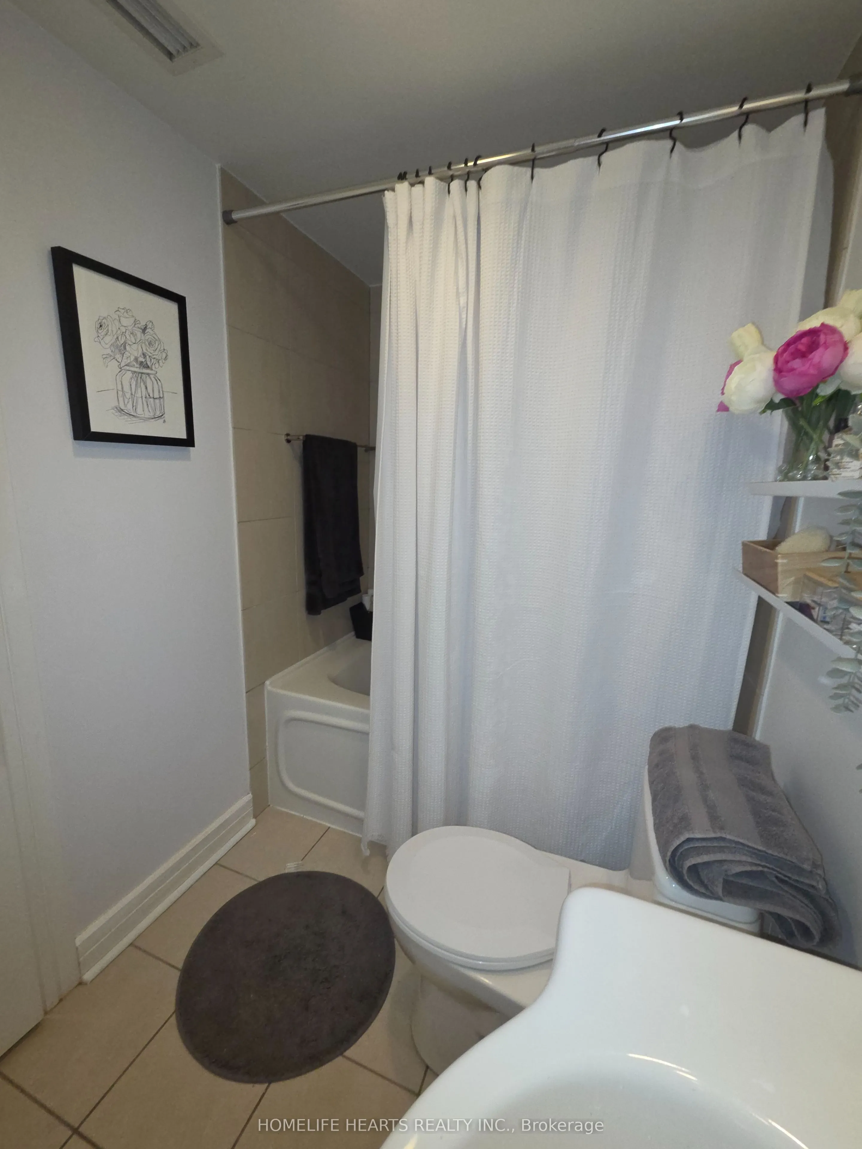 18 Harrison Garden Boulevard #210