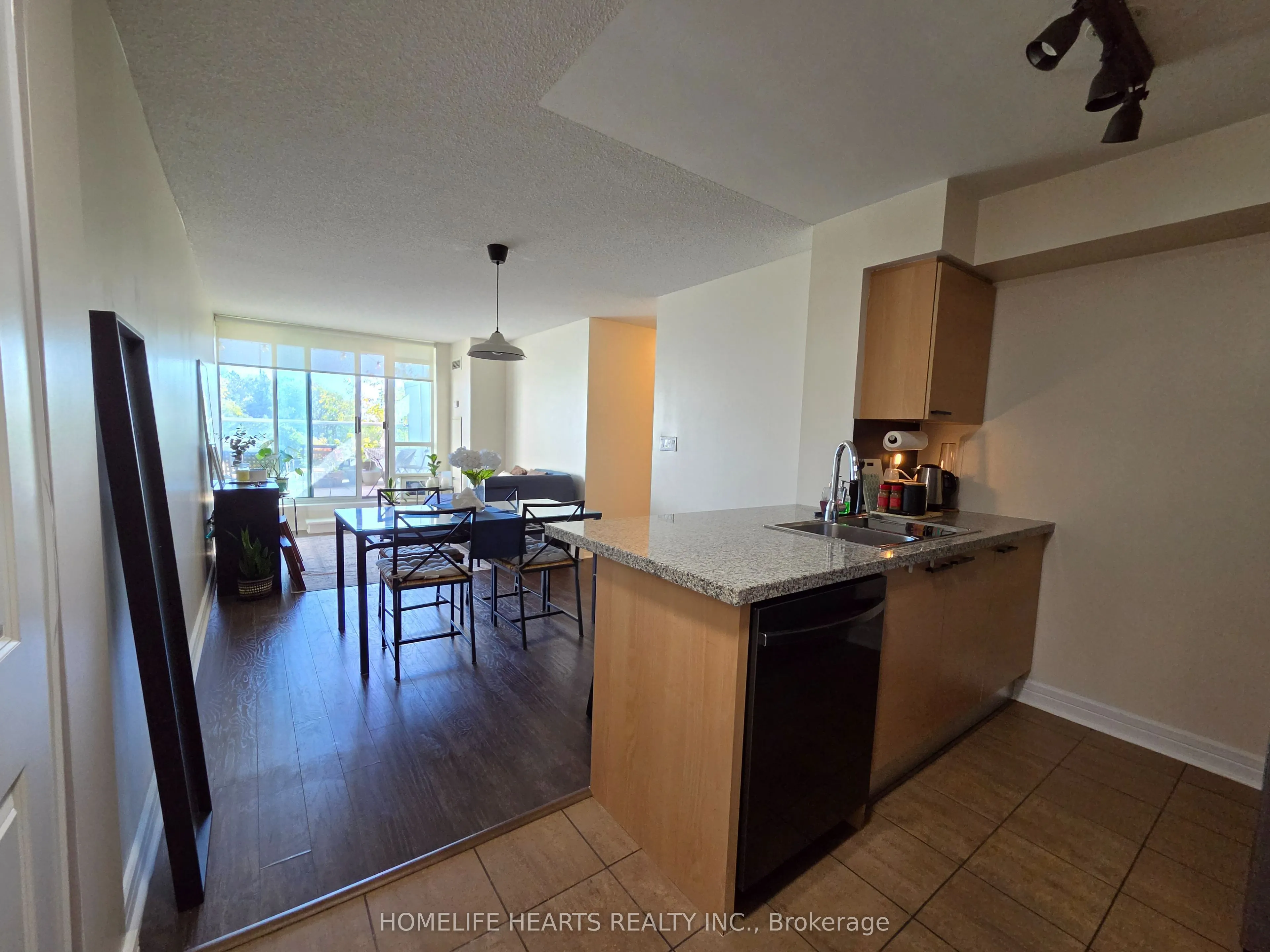 18 Harrison Garden Boulevard #210