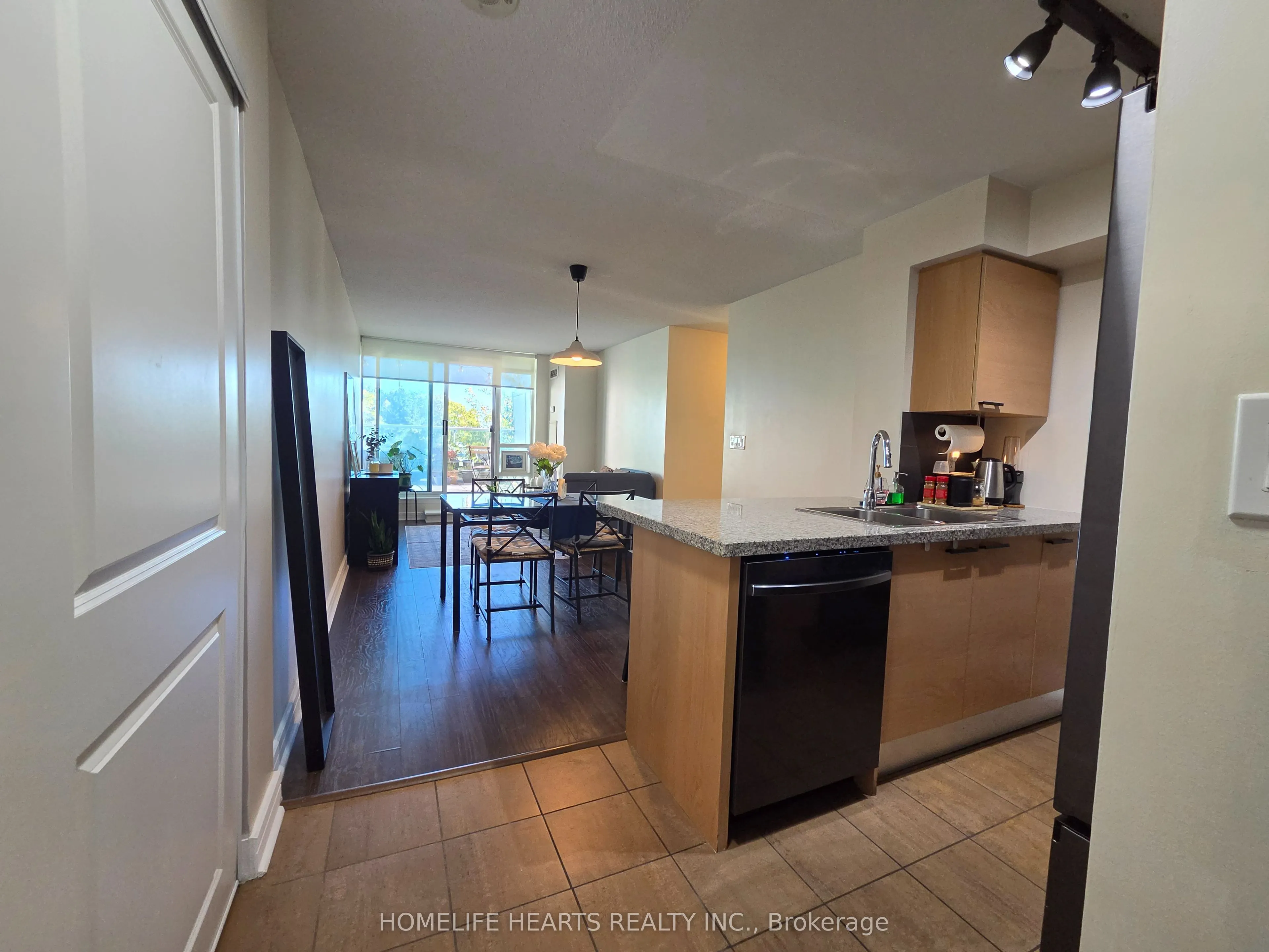 18 Harrison Garden Boulevard #210