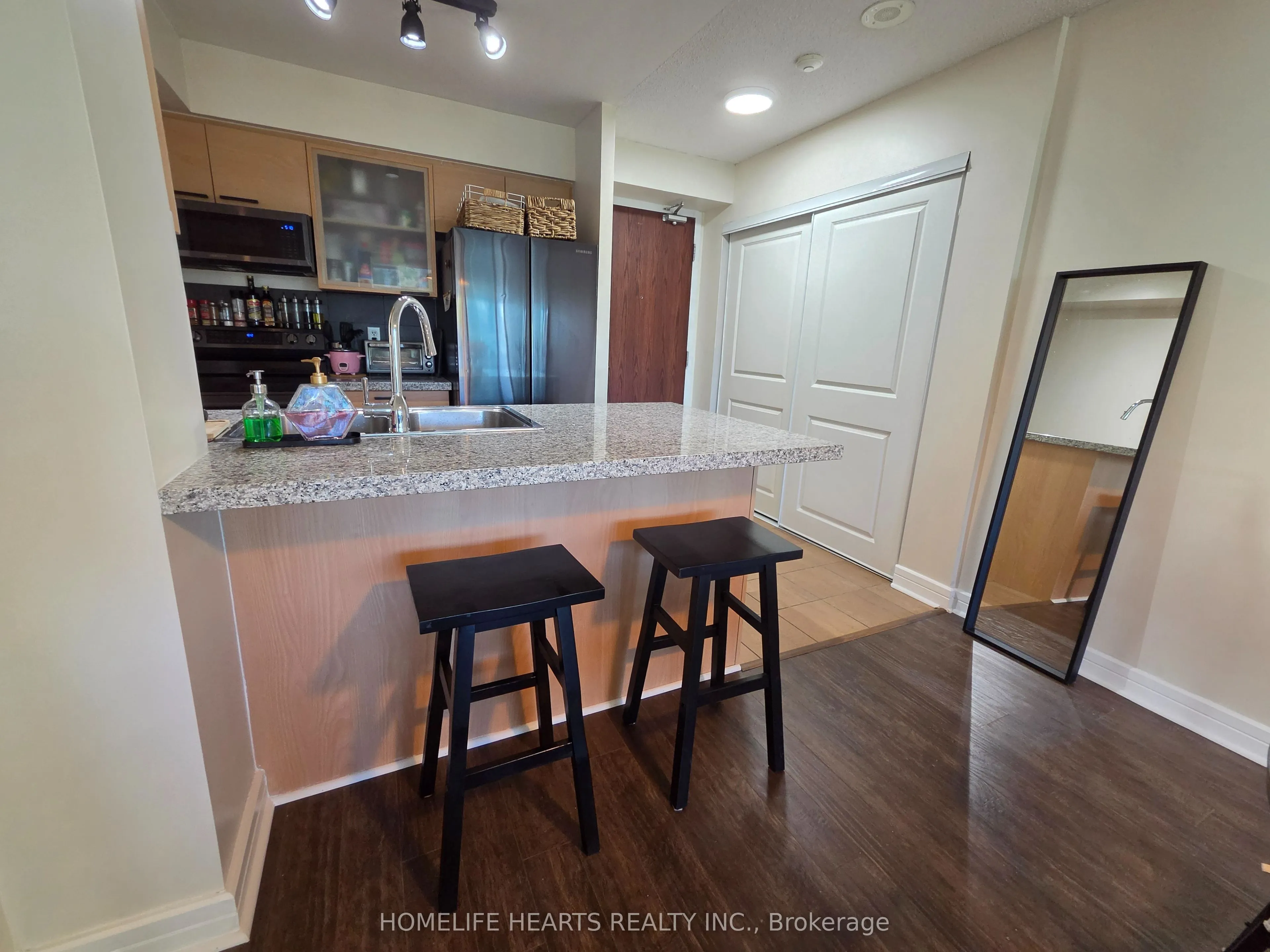 18 Harrison Garden Boulevard #210