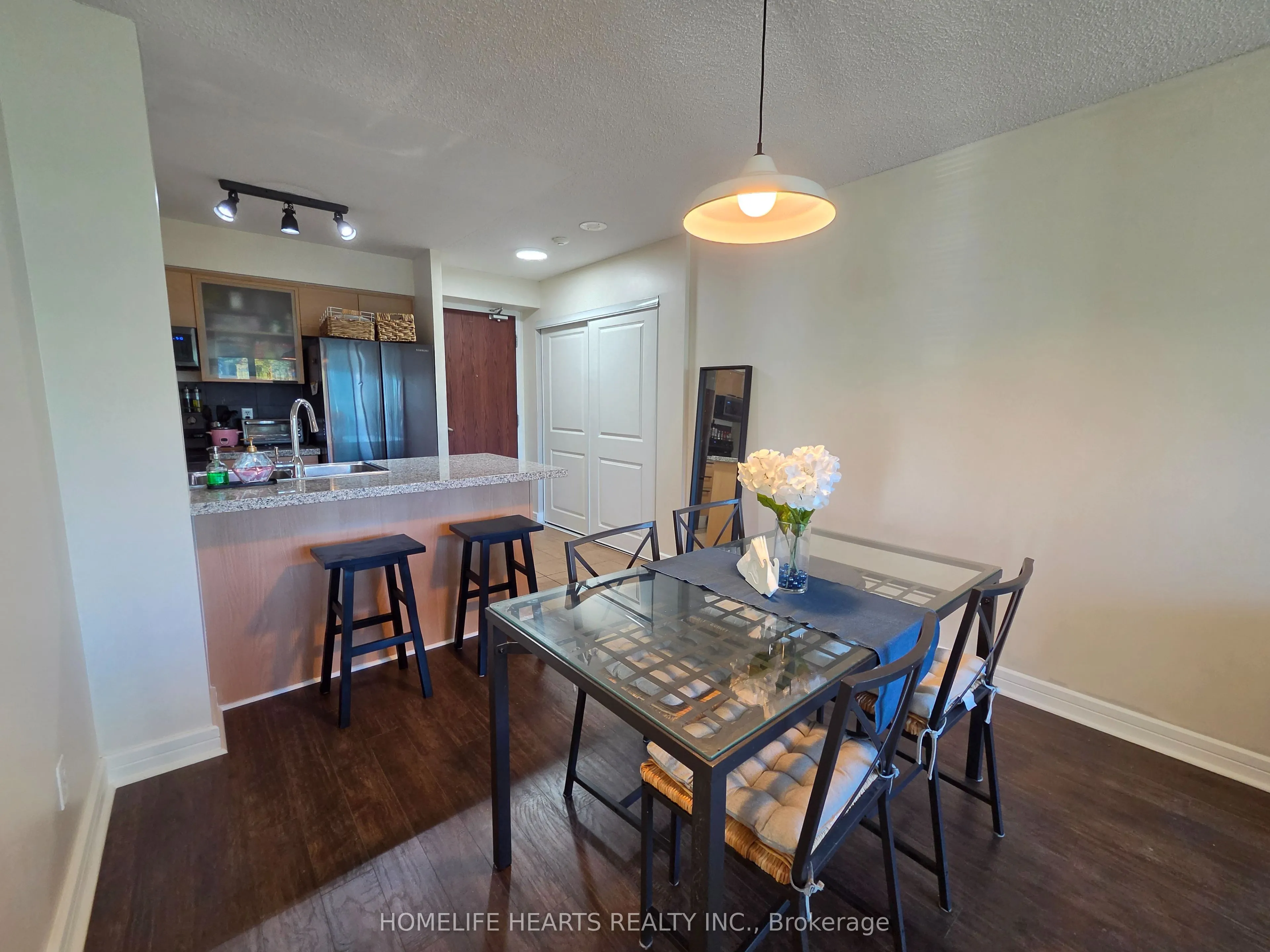18 Harrison Garden Boulevard #210