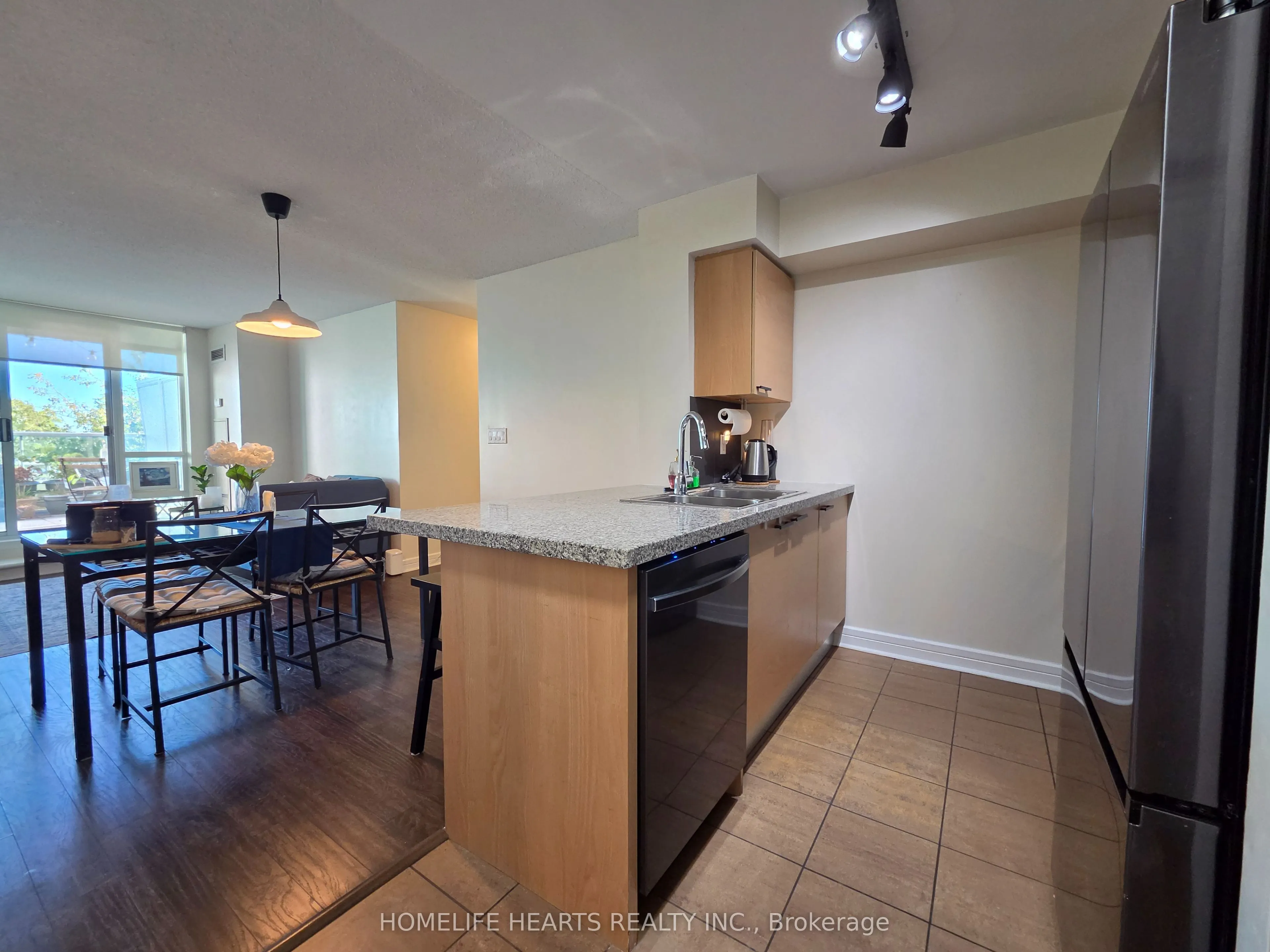 18 Harrison Garden Boulevard #210