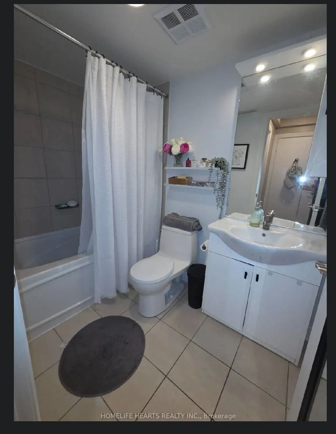 18 Harrison Garden Boulevard #210