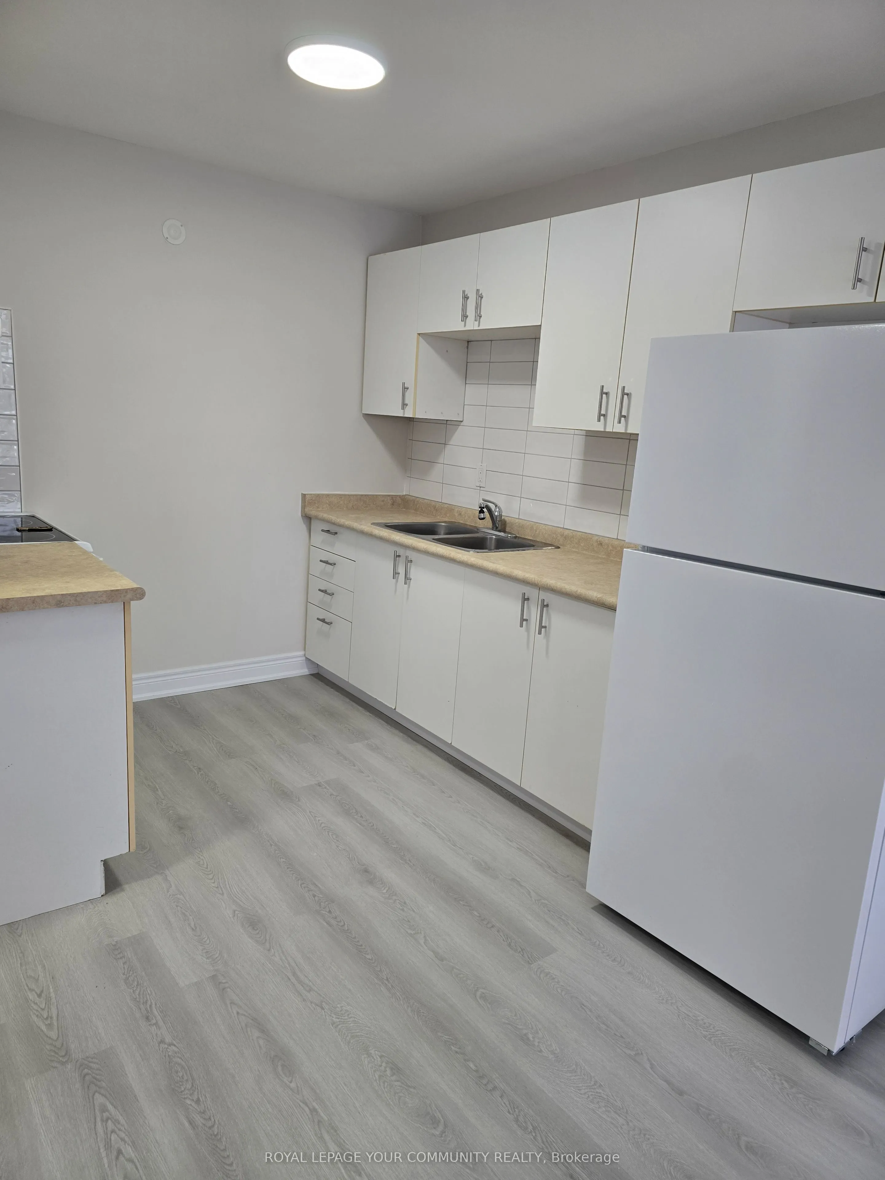 180 Centre Street S, #104