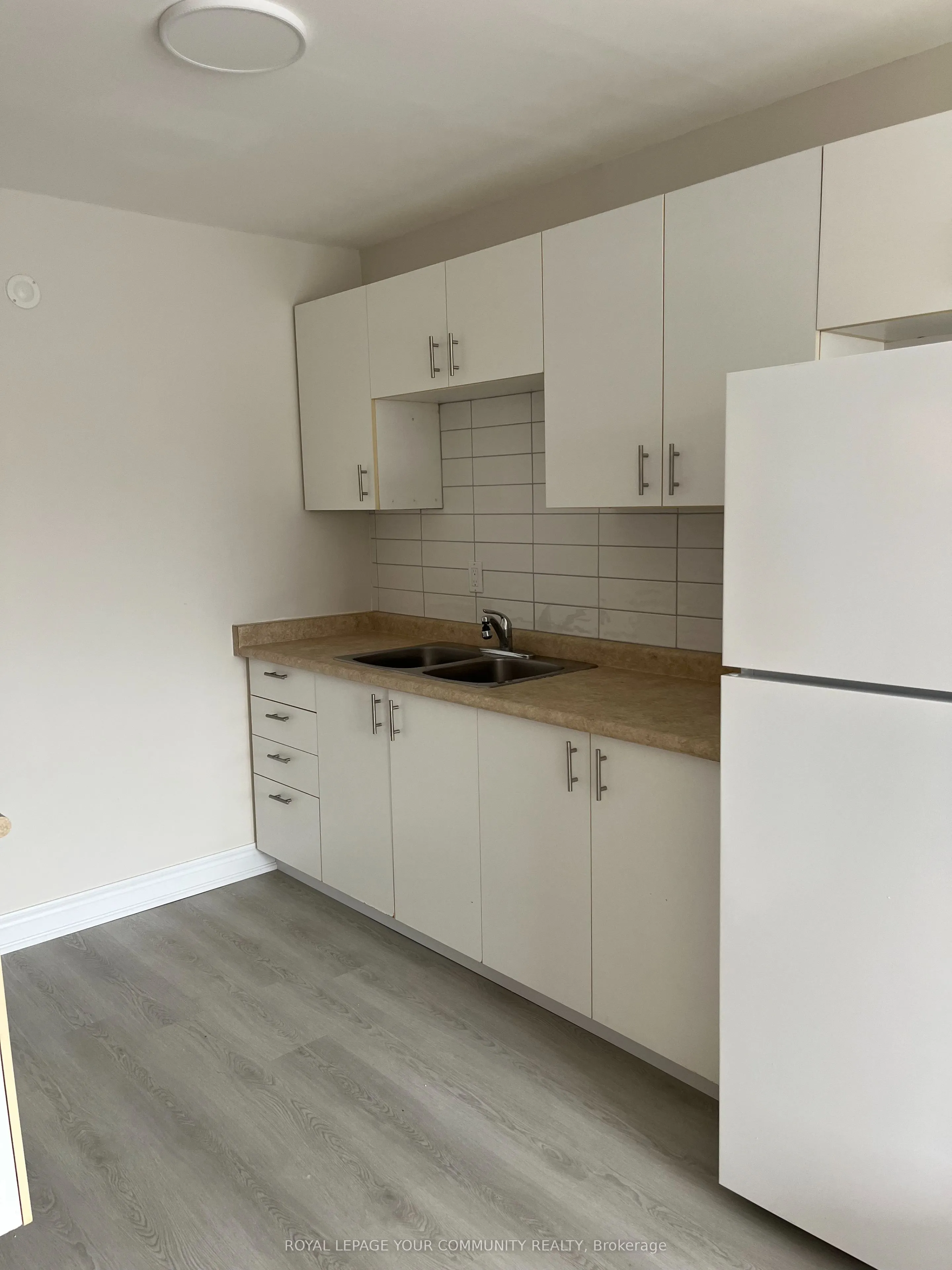 180 Centre Street S, #104