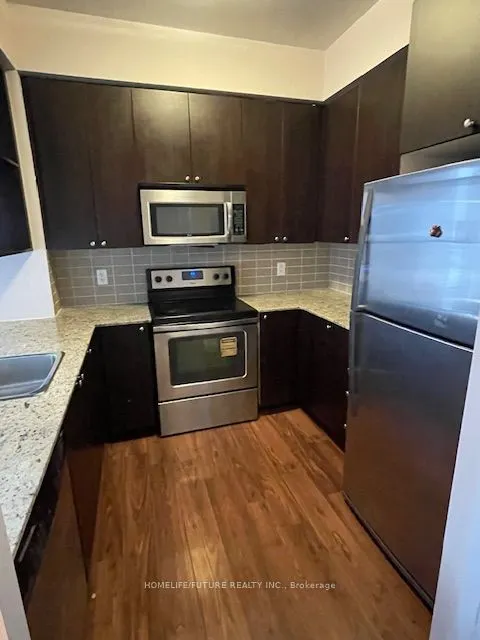 151 Village Green Square, #303
