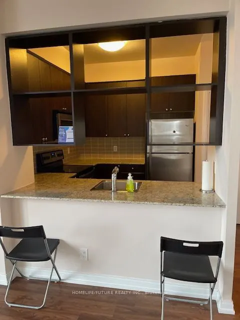 151 Village Green Square, #303