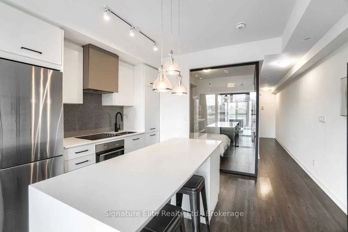 899 Queen Street E, #304