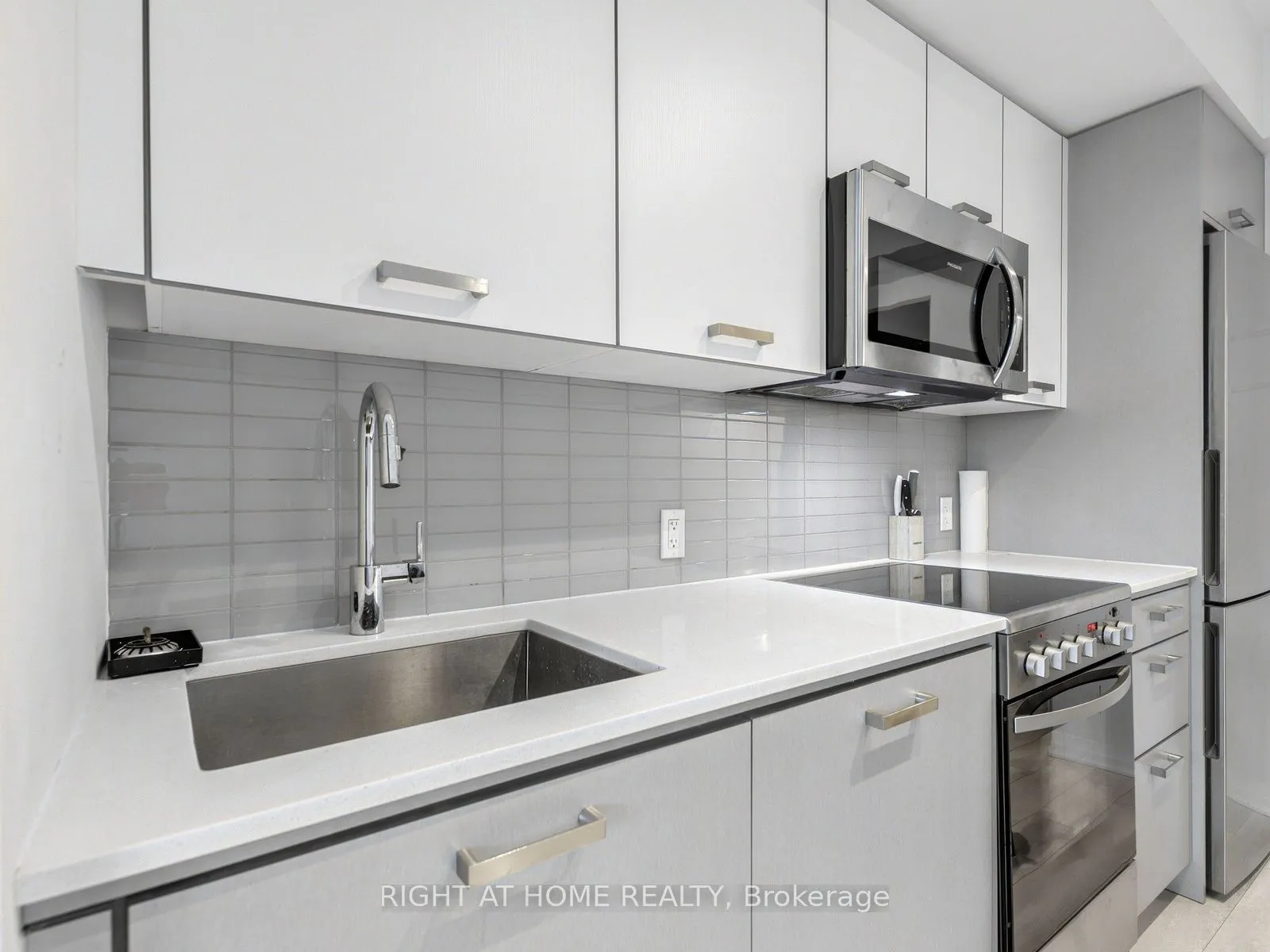 1630 Queen Street E #211